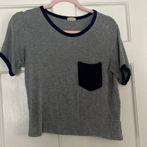 Brandy Melville t shirt. Grey with navy blue piping. Size small.